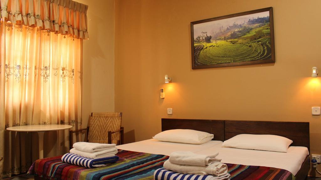 Janishi Residencies Hotel Negombo Quarto foto